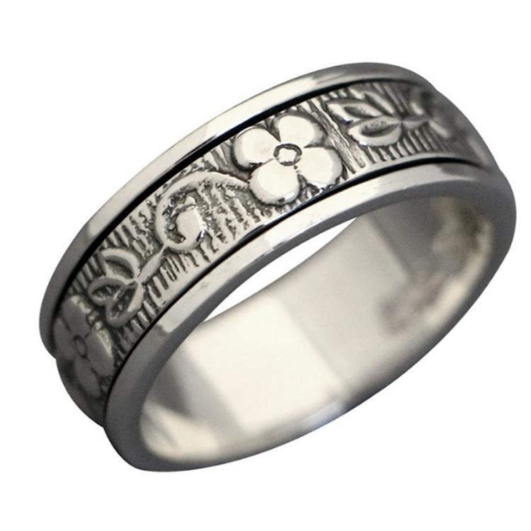 Plum Blossom sterling silver spinner ring by Energy Stone