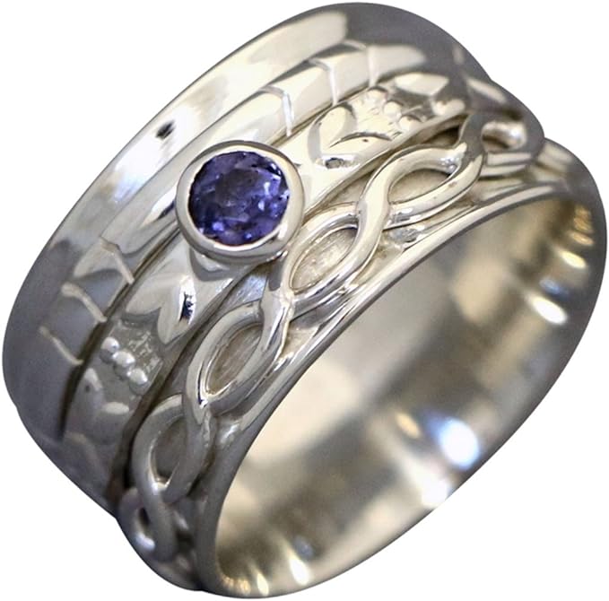 Heartstrings sterling silver spinner ring by Energy Stone