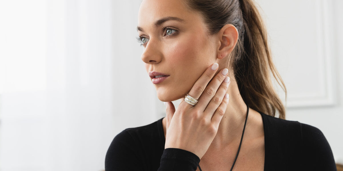 Woman wearing the Clarity spinner ring