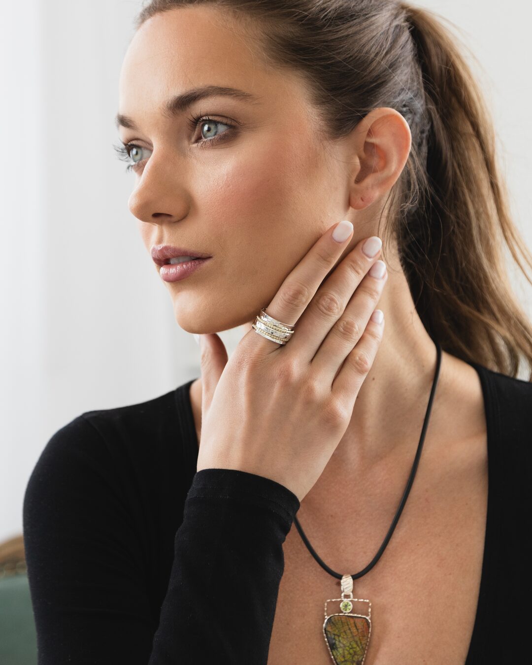 Woman wearing the Clarity spinner ring