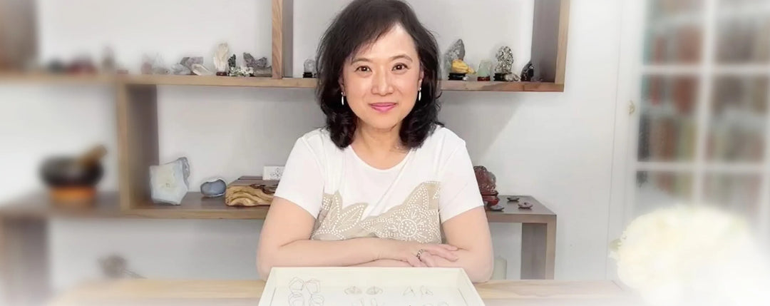 Viola So in her studio with a tray of ring designs