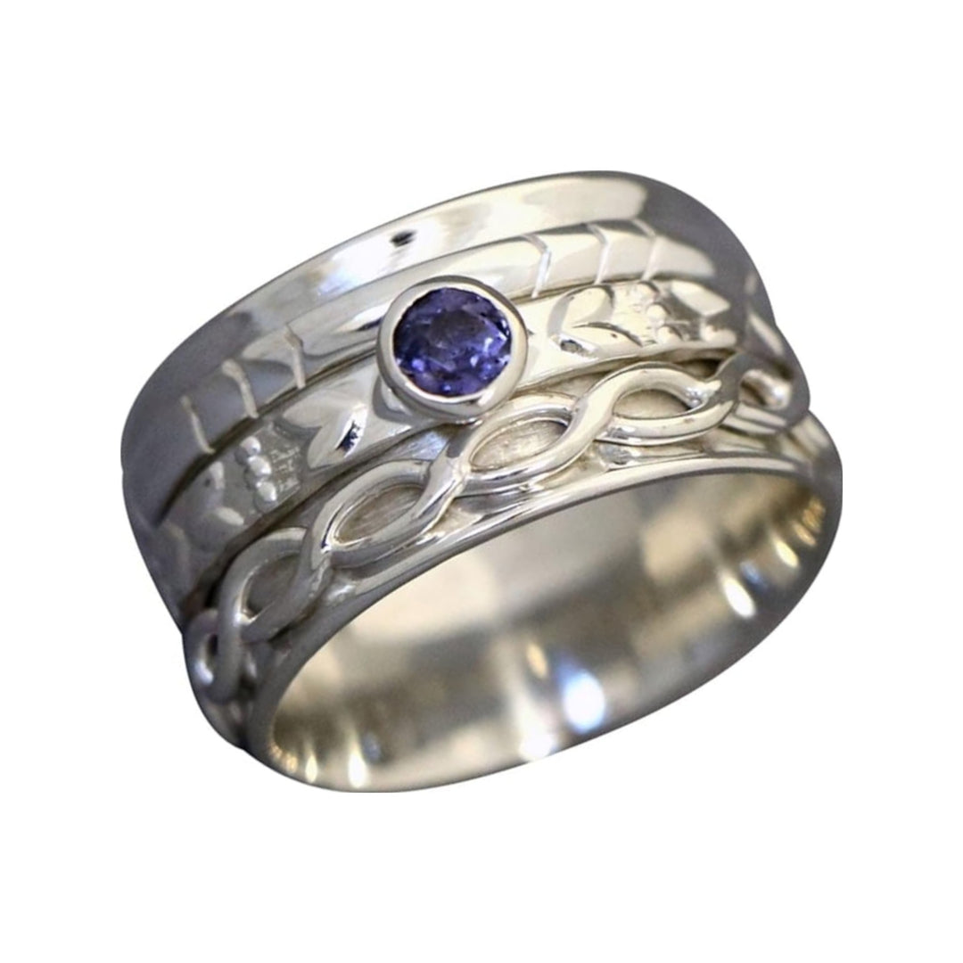 Heartstrings sterling silver spinner ring by Energy Stone