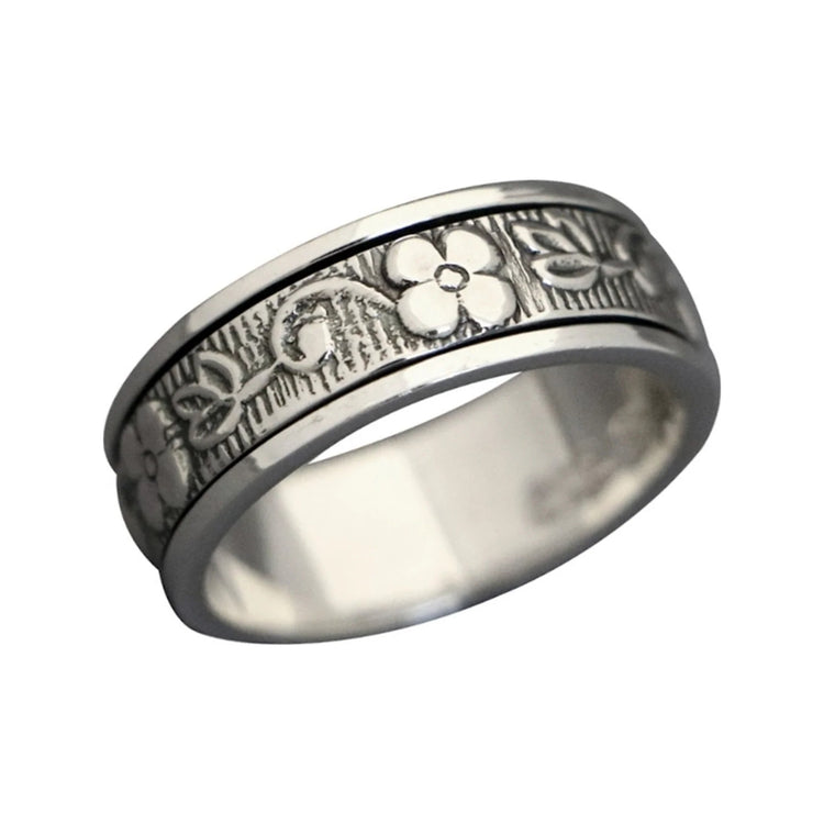 Plum Blossom sterling silver spinner ring by Energy Stone