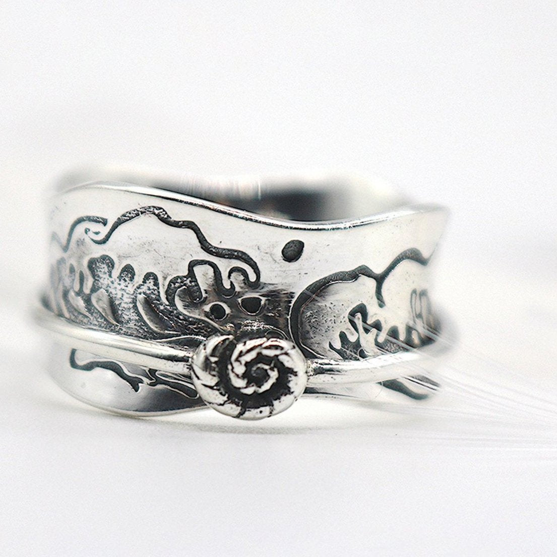 Ocean Kiss sterling silver spinner ring by Energy Stone