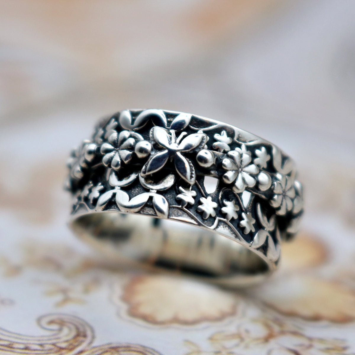Papillon sterling silver spinner ring by Energy Stone