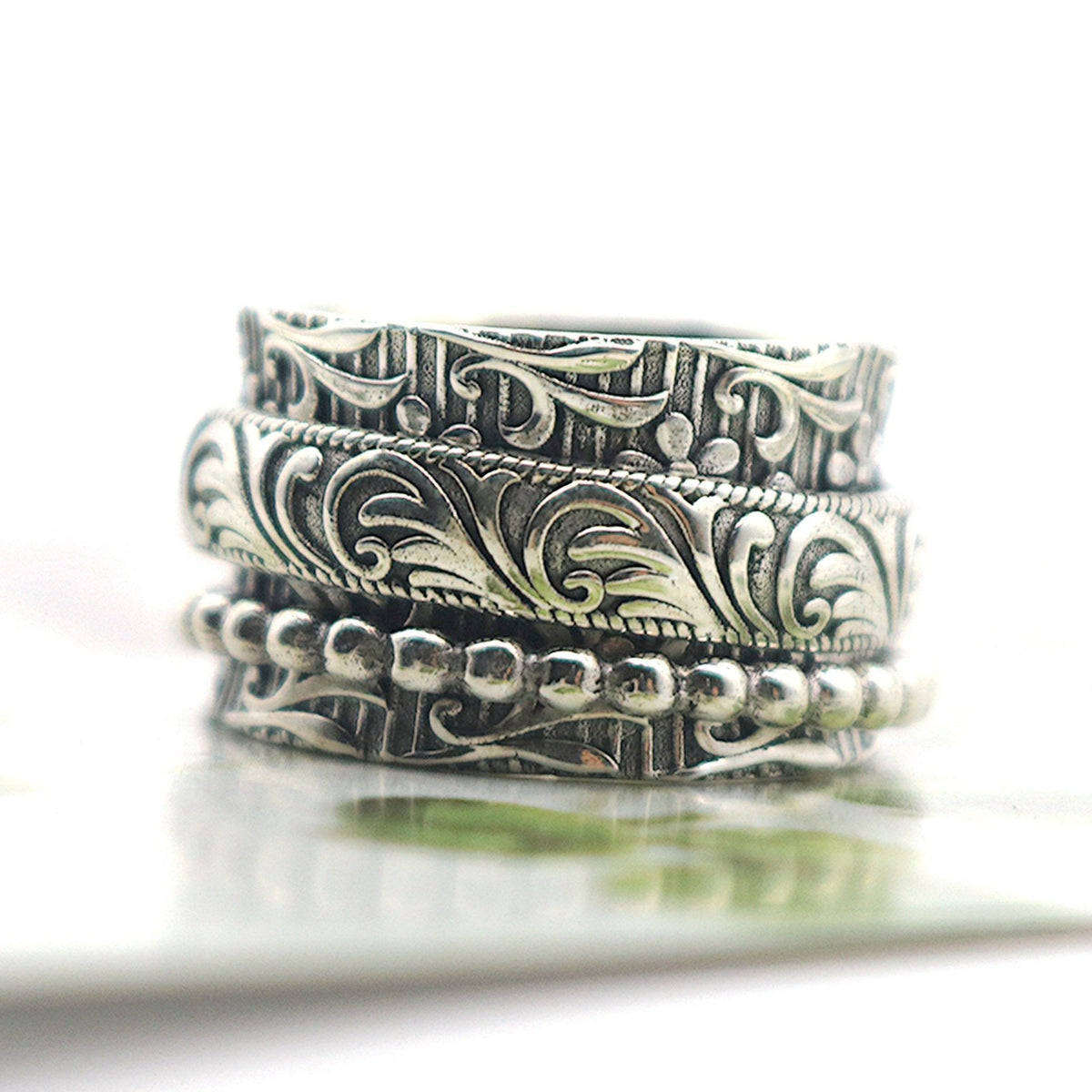 Dancer sterling silver spinner ring by Energy Stone