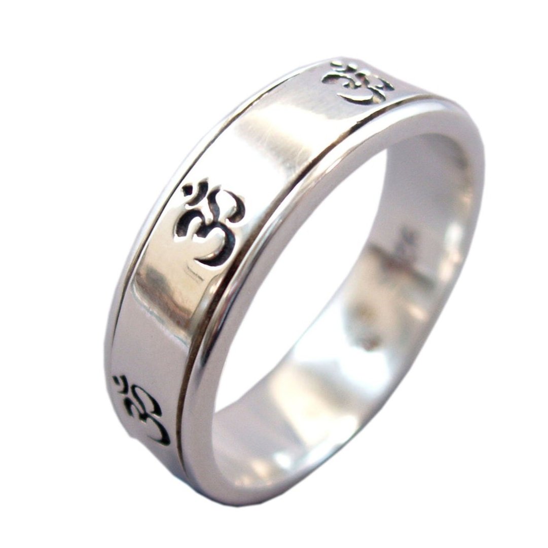 Seven Om sterling silver spinner ring by Energy Stone